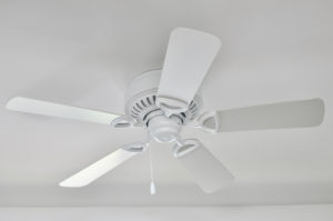 white ceiling fan on white ceiling. 